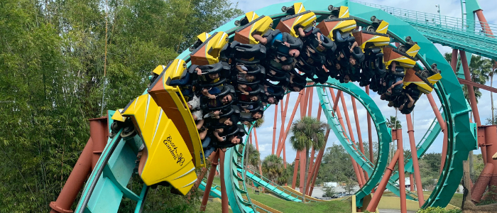 People on a roller coaster at a fun fair